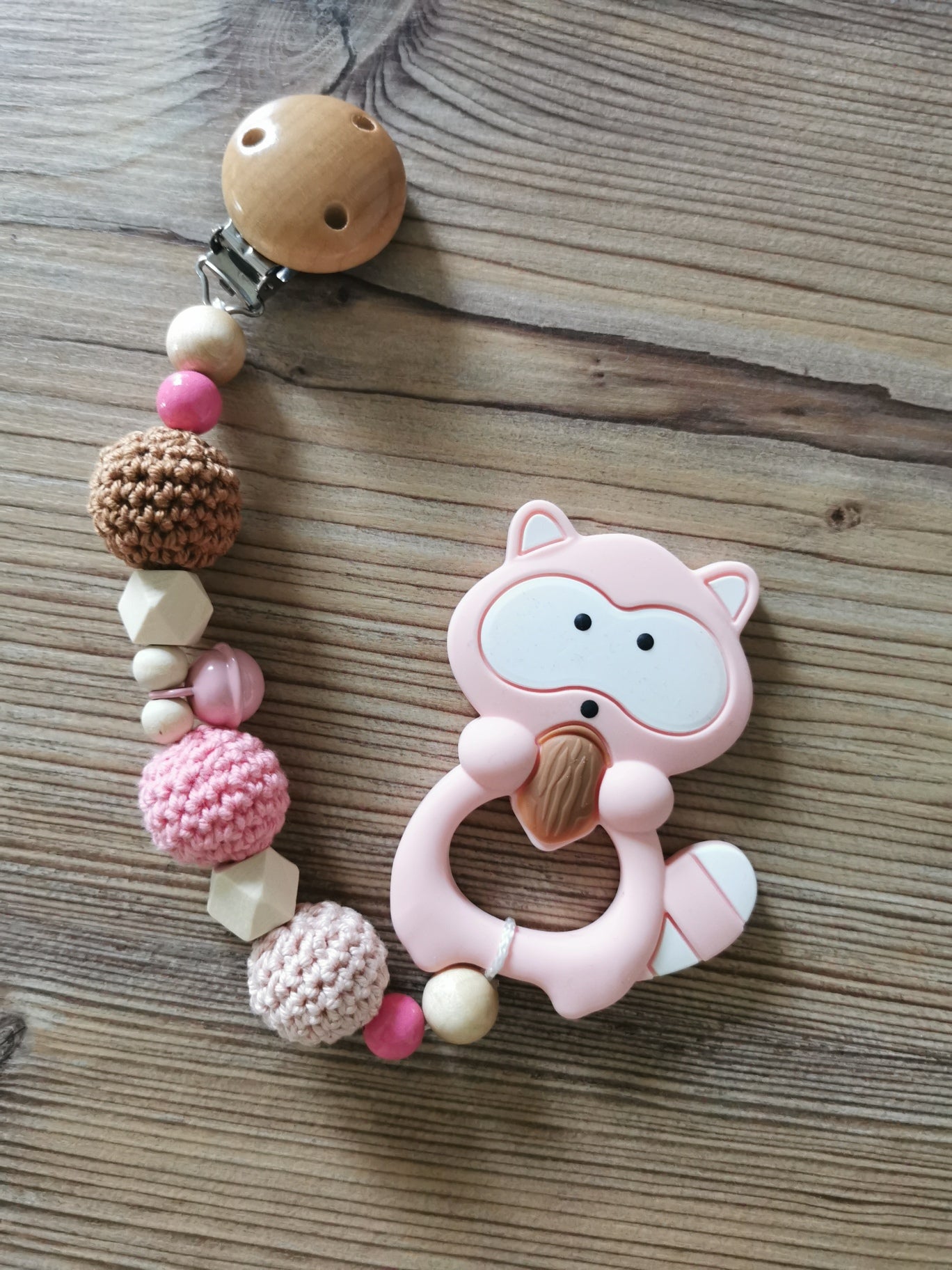 Beißanhänger "Waschbär" rosa