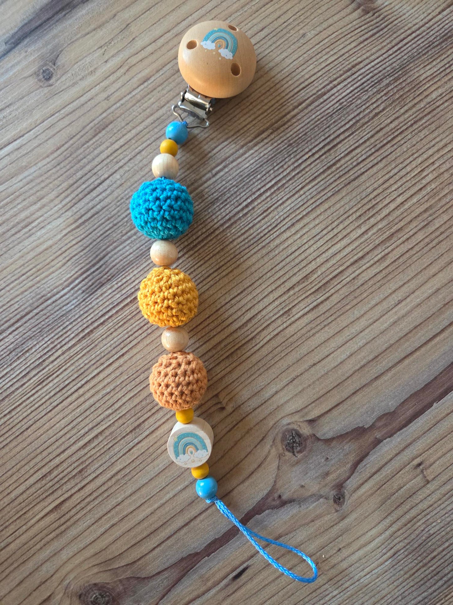 Schnullerkette "Regenbogen" türkis/gelb